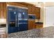 Elegant kitchen with a Viking refrigerator and custom cabinetry at 14725 N Mariposa Ct, Fountain Hills, AZ 85268