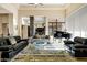 Bright open-concept living room with high ceilings and seamless flow to dining area and kitchen at 14725 N Mariposa Ct, Fountain Hills, AZ 85268