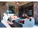 Cozy covered patio area with comfortable seating and stylish decor at 14725 N Mariposa Ct, Fountain Hills, AZ 85268