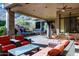 Stylish covered patio with a beautiful water feature and comfortable seating at 14725 N Mariposa Ct, Fountain Hills, AZ 85268