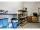 Well-organized storage room with multiple shelves for tools and household products at 14725 N Mariposa Ct, Fountain Hills, AZ 85268