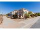 Inviting single-Gathering home featuring desert landscaping and a well-maintained lawn at 1474 E Elysian Pass, Queen Creek, AZ 85140