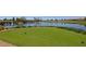 Picturesque golf course view, including the green, water feature, and surrounding landscaping at 1474 E Elysian Pass, Queen Creek, AZ 85140