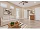 Bright living room with neutral tones, modern art, and stylish furniture at 1474 E Elysian Pass, Queen Creek, AZ 85140