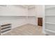 Spacious walk-in closet with built-in shelving and plenty of room for organization at 1474 E Elysian Pass, Queen Creek, AZ 85140