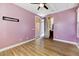 Bedroom with wood floor and large windows at 15260 W Alexandria Way, Surprise, AZ 85379
