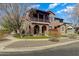 Charming two-story home featuring a covered balcony and inviting curb appeal at 15260 W Alexandria Way, Surprise, AZ 85379