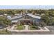 A beautiful exterior view of the property with well-manicured landscaping and a large barn at 15260 W Alexandria Way, Surprise, AZ 85379