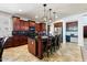 Gourmet kitchen with a large island, granite countertops, and stainless steel appliances at 15260 W Alexandria Way, Surprise, AZ 85379