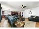 Open concept living room with hardwood floors and lots of natural light at 15260 W Alexandria Way, Surprise, AZ 85379