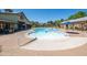 Resort-style pool with various water features and surrounding lounge areas at 15260 W Alexandria Way, Surprise, AZ 85379