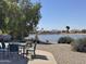 Peaceful backyard view of the water and community at 15720 S Lanai Cir, Arizona City, AZ 85123