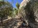 Backyard area featuring landscaping and trees at 15720 S Lanai Cir, Arizona City, AZ 85123