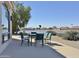 Outdoor patio area with waterfront view and seating at 15720 S Lanai Cir, Arizona City, AZ 85123