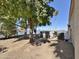Lakeside backyard with trees, providing a serene outdoor space at 15720 S Lanai Cir, Arizona City, AZ 85123