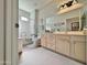 Bright bathroom features a tub, toilet, and vanity with lots of storage at 15720 S Lanai Cir, Arizona City, AZ 85123