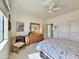 Comfortable bedroom featuring a ceiling fan, bed, dresser, and closet at 15720 S Lanai Cir, Arizona City, AZ 85123