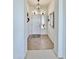 Bright entryway with decorative tile flooring and elegant accents at 15720 S Lanai Cir, Arizona City, AZ 85123