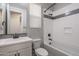 Modern bathroom showcasing a shower-tub combination and a sink with cabinet storage at 16227 W Mariposa Grande --, Surprise, AZ 85387