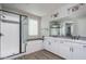 Bright bathroom with a walk-in shower, soaking tub, double sink vanity, and modern fixtures at 16227 W Mariposa Grande --, Surprise, AZ 85387