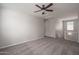 Neutral bonus room with a ceiling fan and a window letting in lots of natural light at 16227 W Mariposa Grande --, Surprise, AZ 85387