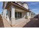 Covered patio with concrete flooring, showcasing the transition from indoor to outdoor living at 16277 W Mariposa Grande --, Surprise, AZ 85387