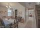 Elegant dining room featuring a chandelier, and stylish decor creating an inviting atmosphere at 16763 W Adams St, Goodyear, AZ 85338