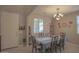 Charming dining room with a spacious table, perfect for Gathering meals and gatherings at 16763 W Adams St, Goodyear, AZ 85338