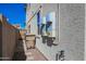 Side of house exterior features utility access and trash container at 16763 W Adams St, Goodyear, AZ 85338