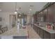 Large kitchen with ample cabinet space, granite counters, and modern appliances at 16763 W Adams St, Goodyear, AZ 85338