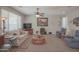Bright living room with neutral paint, plush furniture, and a cozy atmosphere at 16763 W Adams St, Goodyear, AZ 85338