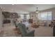 Inviting open-concept living space that seamlessly connects to the kitchen and dining areas at 16763 W Adams St, Goodyear, AZ 85338