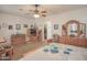 Bright and airy main bedroom with carpet, ceiling fan, and ample closet space for storage at 16763 W Adams St, Goodyear, AZ 85338