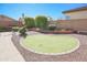 Backyard putting green is perfect for golfers and fun at 16763 W Adams St, Goodyear, AZ 85338
