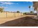 Large backyard with a block wall fence, and a small tree at 18211 N 24Th Ave, Phoenix, AZ 85023