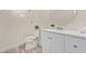 Modern bathroom featuring a walk-in shower with marble tile and a white vanity at 18211 N 24Th Ave, Phoenix, AZ 85023