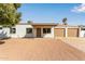 Charming single-story home features a welcoming front porch and a spacious two-car garage at 18211 N 24Th Ave, Phoenix, AZ 85023
