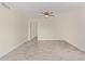 Bright living room features neutral paint and gray wood-look tile flooring at 18211 N 24Th Ave, Phoenix, AZ 85023