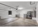 A clean and organized two-car garage offers ample space for storage and a clean concrete floor at 18369 W La Senda Dr, Surprise, AZ 85387