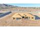 New home under construction with an attached garage in a scenic, developing neighborhood at 20256 W Highland Ave, Litchfield Park, AZ 85340