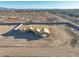 Aerial view of home under construction showing the framing and roof sheathing with expansive desert views at 20277 W Highland Ave, Litchfield Park, AZ 85340