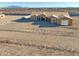 Aerial view of home in framing stage showcasing construction and desert landscape at 20277 W Highland Ave, Litchfield Park, AZ 85340