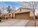 Well-kept home with a two-car garage, extended driveway, and minimal landscaping in a quiet neighborhood at 2110 S 102Nd Ln, Tolleson, AZ 85353