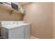 Laundry room featuring front loading washer and dryer at 2110 S 102Nd Ln, Tolleson, AZ 85353