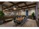 Elegant conference room with large mirror, wood beams, and seating for twelve at 2232 W Chisum Trl, Phoenix, AZ 85085