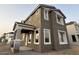 Newly built two-story home with crisp white trim, contemporary design, and a welcoming covered porch at 2232 W Chisum Trl, Phoenix, AZ 85085