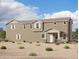 Spacious two-story home with a welcoming covered entryway, neutral stucco, and low-maintenance desert landscaping at 2232 W Chisum Trl, Phoenix, AZ 85085