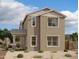 Charming two-story home with neutral tones, white trim, a covered porch, and well-manicured desert landscaping at 2232 W Chisum Trl, Phoenix, AZ 85085
