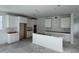 Unfinished kitchen with stylish white cabinets, potential for island installation, and modern design at 2232 W Chisum Trl, Phoenix, AZ 85085