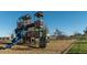 A community playground featuring a slide, climbing structure, and various play elements offers fun for children at 2232 W Chisum Trl, Phoenix, AZ 85085